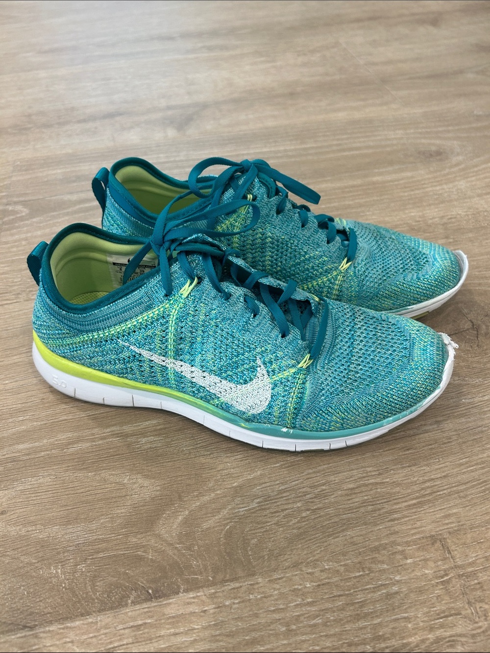 Nike Women’s Teal Knit Training Shoes with White Swoosh